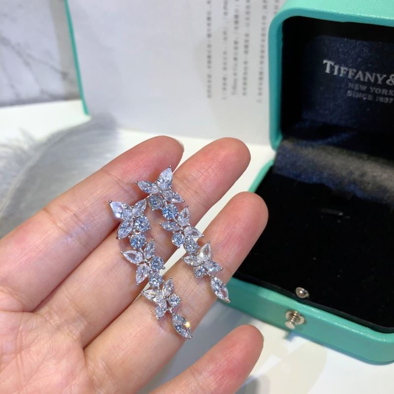 T*f*ny earrings